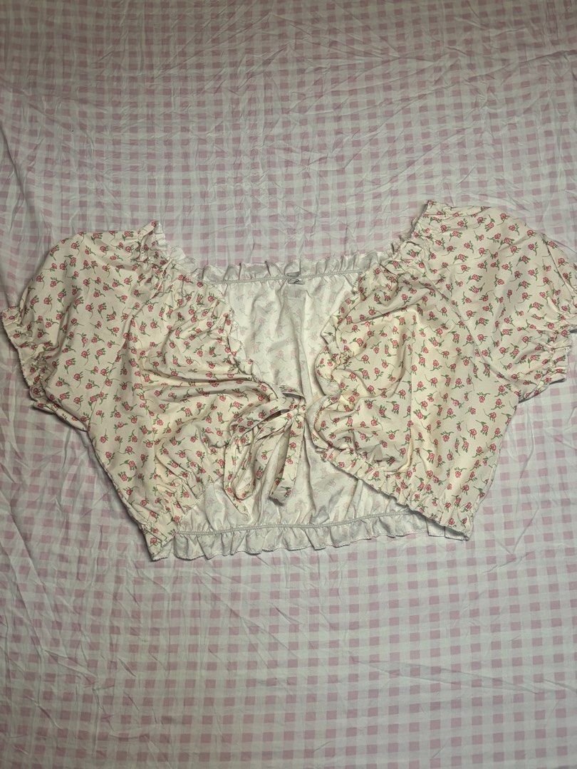 Korean Floral Crop Top Tie Front (Category: Others Tops) located in San Juan City. Submitted by angel_aura_archive (Listing ID 1468340766, Image 2). Description: - Free size can fit upto XL if stretched - All of the details are here n po so pls matuto po magbasa and no to low bailers!! I can give discount if marami po kukunin. They are not from ukay and they are from my personal collection from my closet (purpose is to declutter)..