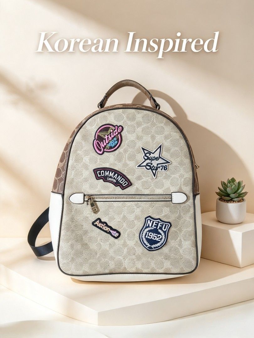 Korean Inspired Monogram Print Backpack with Embroidered Patches (Category: Backpacks) located in Batangas. Submitted by mace2014 (Listing ID 1468307512, Image 1). Description: - Korean-inspired design with chic brown monogram print and white leather trim - Adorned with trendy embroidered patches ('Outside', 'COMMANDO', 'Action', 'NEFU 1952', and stars) - Convenient front zippered pocket with gold hardware - Comfortable with a sturdy top handle a