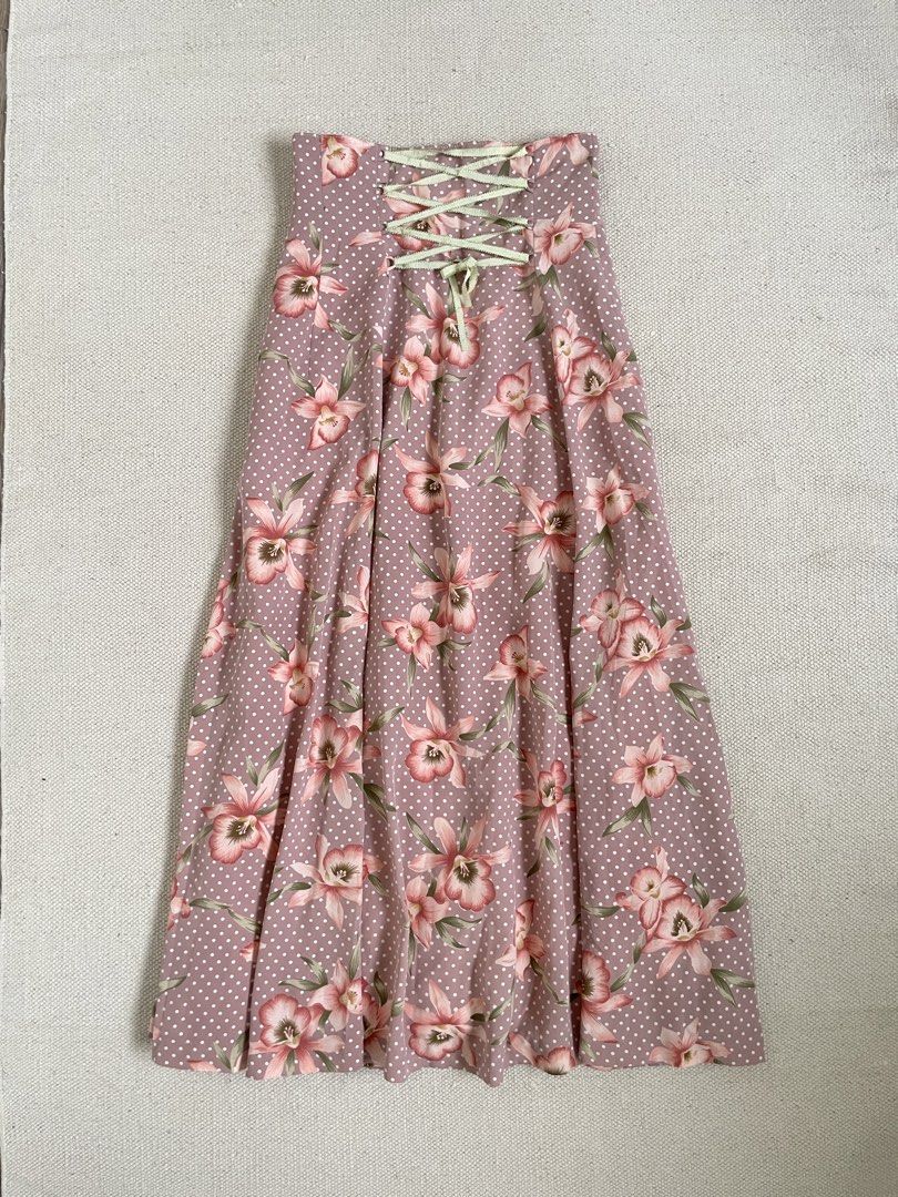 La Chatte pink floral polka dot corset (Category: Skirts) located in Davao. Submitted by re.createph (Listing ID 1468447572, Image 1). Description: - Pink with white polka dots and floral pattern - high waist, maxi length, back lace-up corset detail Waist: 27” Length: 34” .