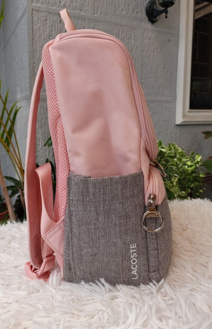 Lacoste backpack (Category: Backpacks) located in Rizal. Submitted by astrid20 (Listing ID 1468330277, Image 2). Description: Preloved Lac🐊ste backpack Used in Hk lang Need to wash lang ung pink part dahil sa pgkakastore Clean interior L: 10.4in / W: 5.5in / H: 13.5in Open for layaway . #authenticlacoste #lacostebag #prelovedlacostebag #lacosteforsaleph #notofake.