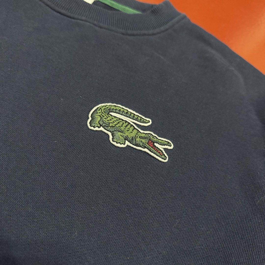 LACOSTE BIG LOGO PATCH PULLOVER (Category: Coats, Jackets and Outerwear) located in Pasig City. Submitted by buzzthrifty (Listing ID 1468388594, Image 2). Description: SIZE M-L MEN L-XL WOMEN 23x25 EXCELLENT CONDITION .