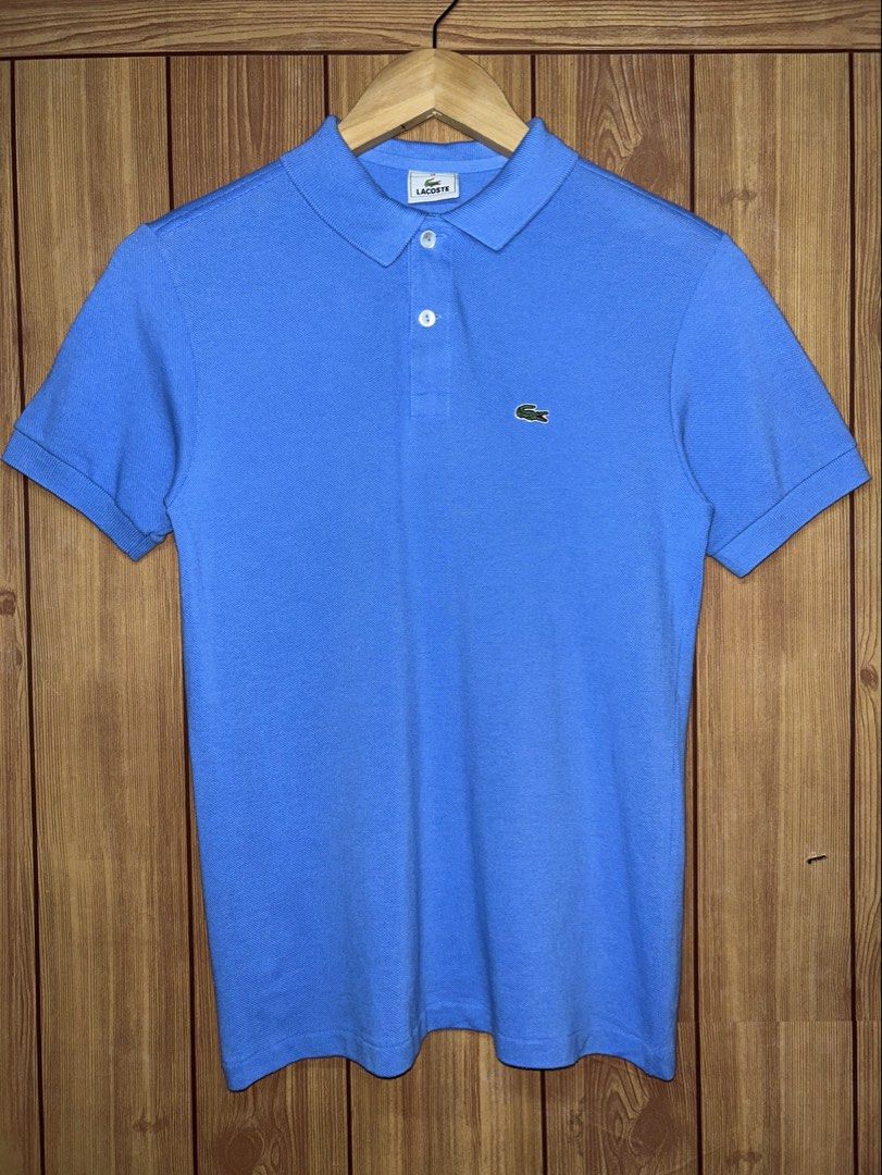 Lacoste Classic Fit Short Sleeve Polo (Category: Tshirts & Polo Shirts ) located in Manila. Submitted by zerowasteco. (Listing ID 1468455225, Image 1). Description: -As new condition -10/10 Color rate -Dimes:L25xW17 -Size 14 on tag -No issue -Unisex✅ Dm for more info!.