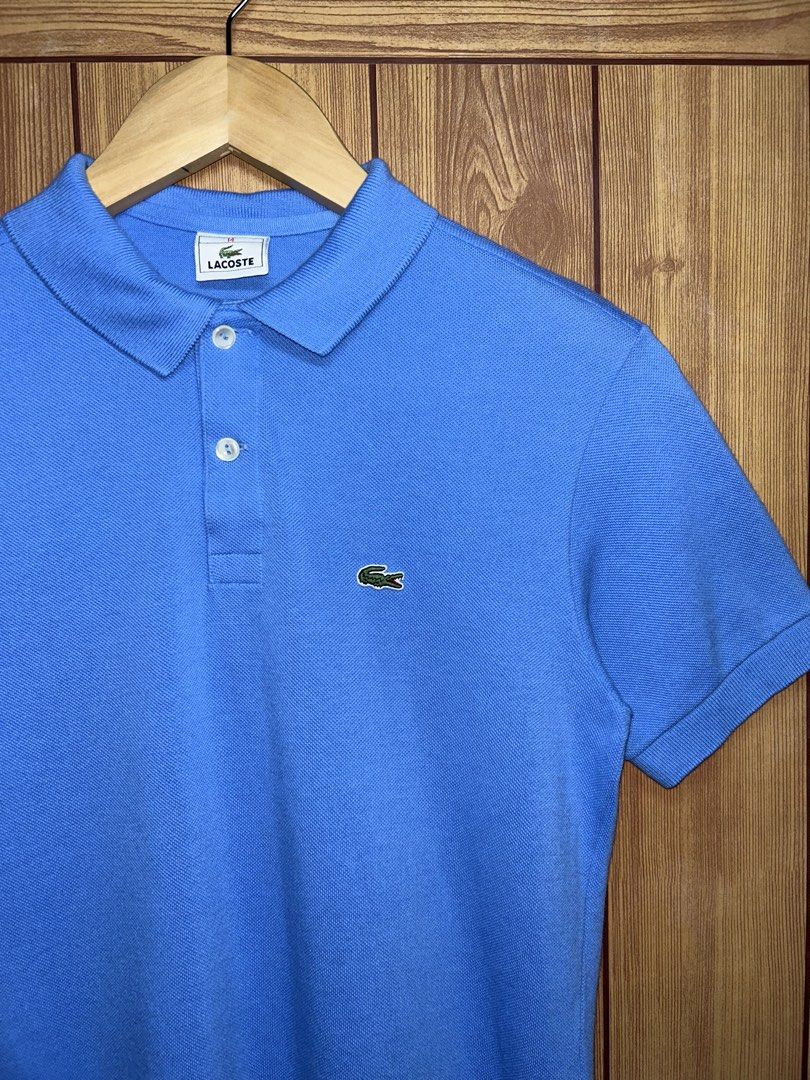 Lacoste Classic Fit Short Sleeve Polo (Category: Tshirts & Polo Shirts ) located in Manila. Submitted by zerowasteco. (Listing ID 1468455225, Image 2). Description: -As new condition -10/10 Color rate -Dimes:L25xW17 -Size 14 on tag -No issue -Unisex✅ Dm for more info!.