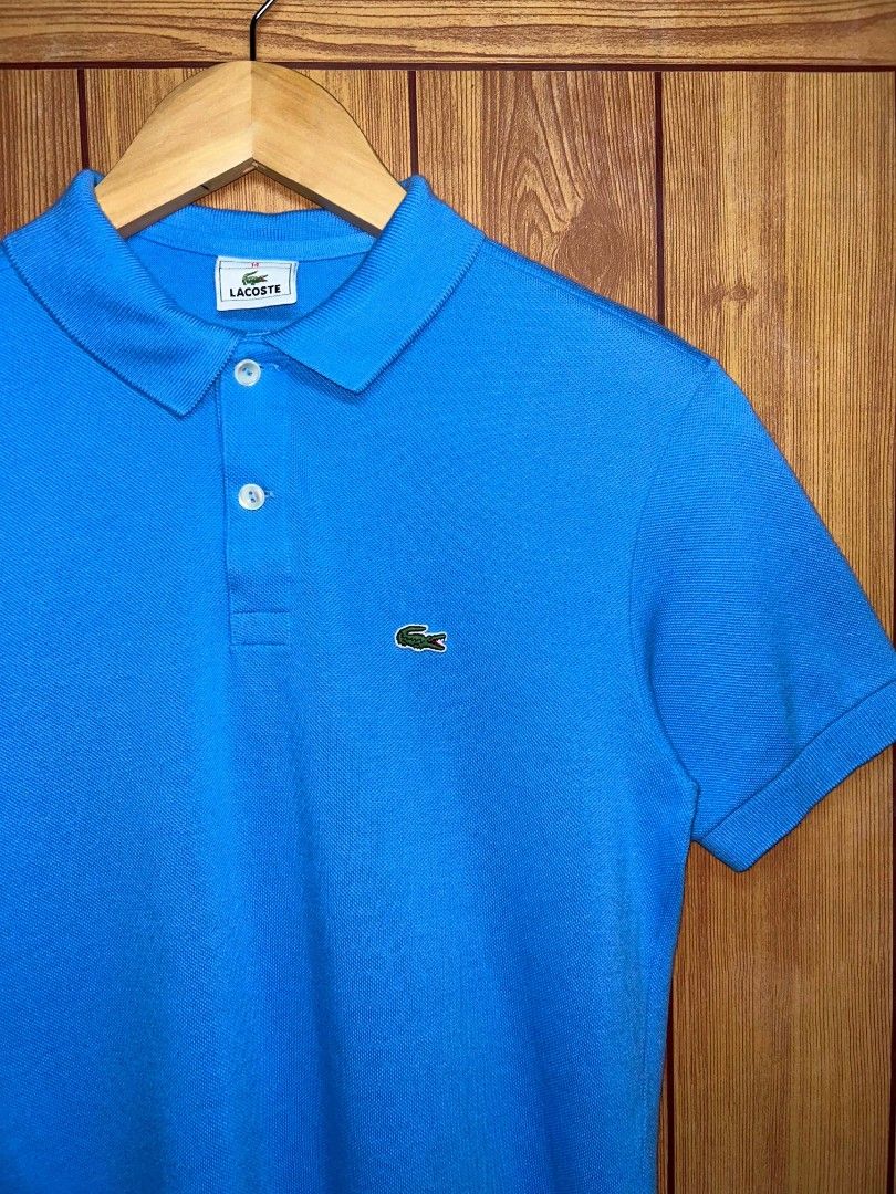 Lacoste Classic Fit Short Sleeve Polo (Category: Tshirts & Polo Shirts ) located in Manila. Submitted by zerowastethriftco. (Listing ID 1468460189, Image 2). Description: -As New Condition -10/10 Color Rate -Dimes L25xW17 -No Issue -Unisex✅.