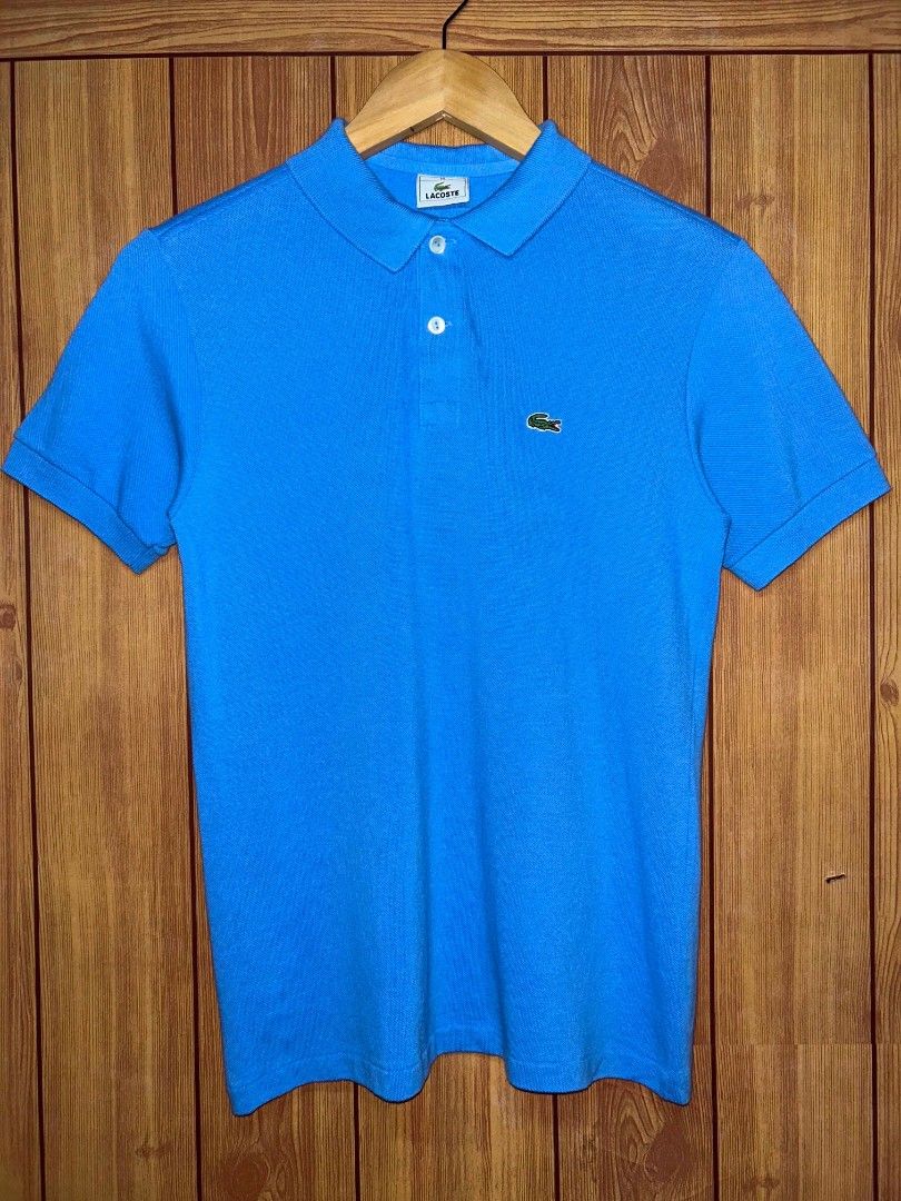 Lacoste Classic Fit Short Sleeve Polo (Category: Tshirts & Polo Shirts ) located in Manila. Submitted by zerowastethriftco. (Listing ID 1468460189, Image 1). Description: -As New Condition -10/10 Color Rate -Dimes L25xW17 -No Issue -Unisex✅.
