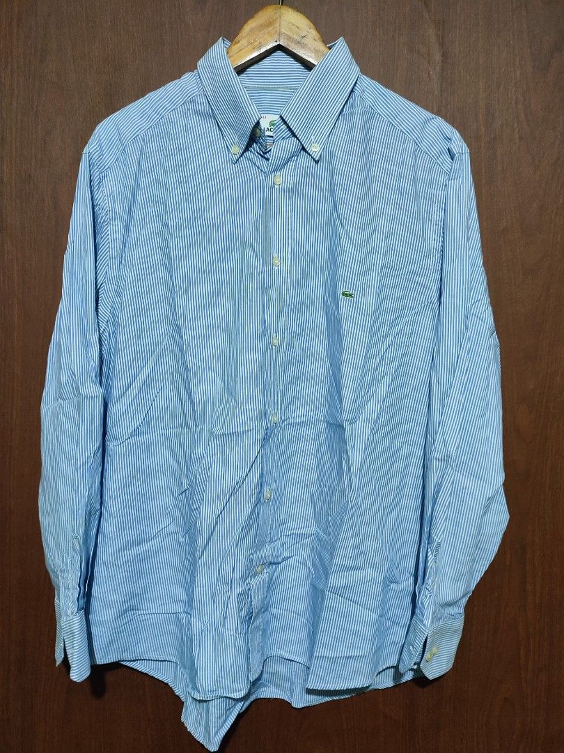 Lacoste longsleeve light blue stripes (Category: Formal Shirts) located in Pasig City. Submitted by supremokicksmanila (Listing ID 1468478329, Image 1). Description: Lacoste longsleeve light blue stripes 24x30 fits to large excellent condition 1499 shipped dm to purchase lalamove with in metromanil j&t delivery outside mertomanila.