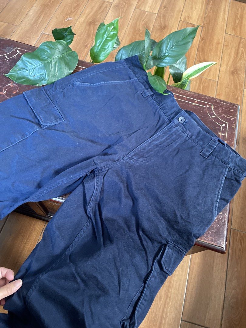 Lacoste Navy Blue Cargo Pants (Category: Joggers) located in Manila. Submitted by barrybalenshagga (Listing ID 1468355042, Image 1). Description: size 36-38 - Brand: Lacoste - Color: Navy Blue - Material: Durable, high-quality cotton - Fit: Classic straight leg cut - Features: Practical side cargo pockets and back pockets with button flaps - Branding: Iconic embroidered green crocodile logo on the back right pocket - Style: Versatile and comforta