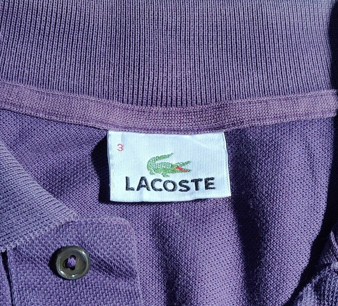 Lacoste Polo Shirt (Category: Tshirts & Polo Shirts ) located in Bangued. Submitted by daysusagoodies (Listing ID 1468326920, Image 3). Description: LACOSTE Color: 🟣 Rate 9/10 Size 3 on the tag W18.5xL25 Good condition Issue collar is slightly faded.