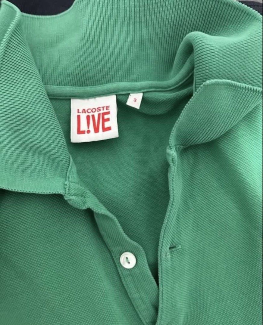Lacoste Polo Shirt (Category: Tshirts & Polo Shirts ) located in Subic. Submitted by declutterbyshit (Listing ID 1468340426, Image 2). Description: - Size: 3 (27.5x18 ) - Size: Tagged Size 3 (fits like Medium) - Design: Classic two-button placket with ribbed collar and cuffs - Detail: Signature embroidered crocodile logo on the chest - Condition: Clean fabric texture, well-maintained, and ready to wear.