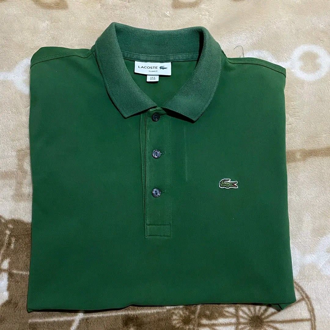Lacoste Polo Shirt (Category: Shirts) located in Manila. Submitted by bidgeyow20688 (Listing ID 1468345513, Image 1). Description: authentic womens good condition no issue/needwash 18x28.