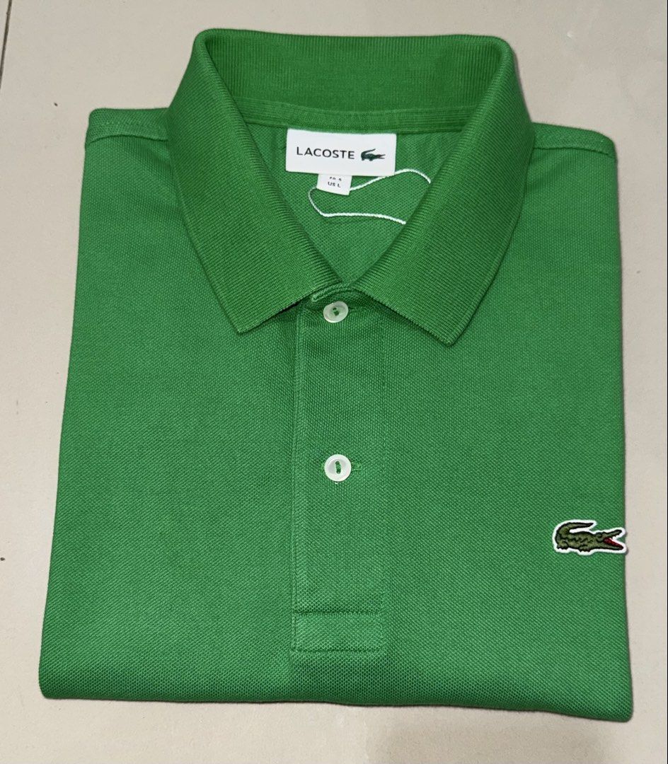 Lacoste Polo Shirt (Category: Tshirts & Polo Shirts ) located in Bacolod City. Submitted by thriftppy_ (Listing ID 1468361859, Image 3). Description: LACOSTE GREEN POLO SHIRT Size: 5 Width: 22 Length: 28 Color rate: 9.8/10 Condition: Excellent near new Issue: None 💰1.3 DM for sure buyers 📥 Mode of payment:GCASH, BANK TRANSFER Unli vouch and vc for safety transaction. 📌Color may vary due to lighting📸 📦 Shipping via JNT EXPRESS🚚 📍Location: B