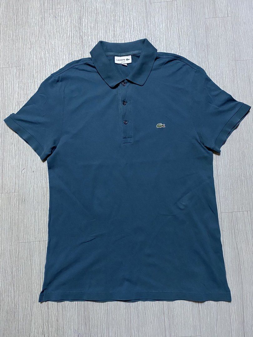 Lacoste Slim Fit (Category: Tshirts & Polo Shirts ) located in Pasig City. Submitted by terrencec34805 (Listing ID 1468473956, Image 1). Description: Lacoste Slim fit polo shirt In good condition Size:Large Width:19 Length:28.