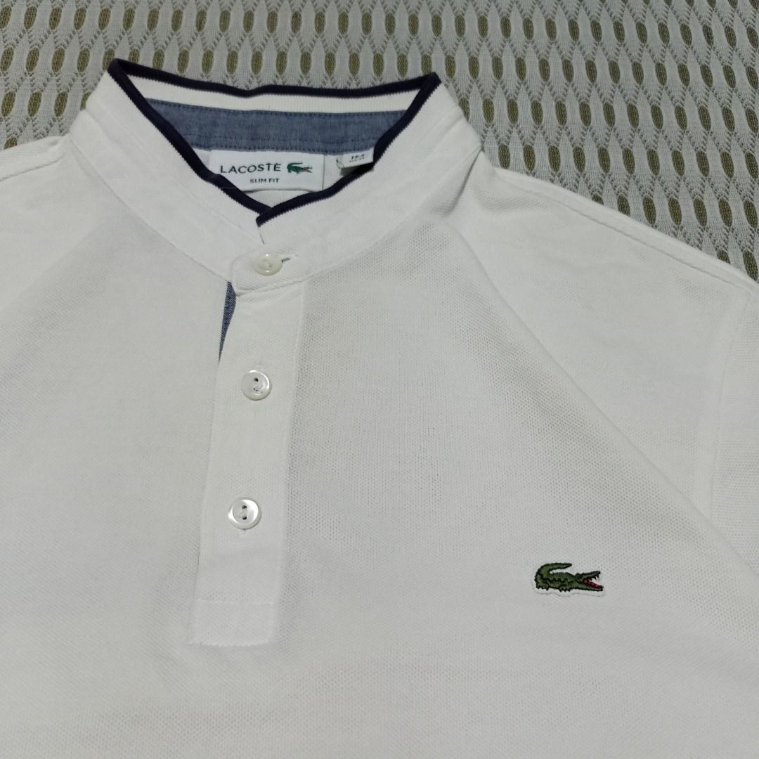 Lacoste Slim Fit White Mandarin Collar Size 4 (Category: Tshirts & Polo Shirts ) located in General Santos City (Dadiangas). Submitted by collection_9500 (Listing ID 1468499714, Image 2). Description: Lacoste Slim Fit White Mandarin Collar Size 4 20.5 x 26 Medium Excellent, washable stain Gensan loc Pm for inquiries All are thrifted items.
