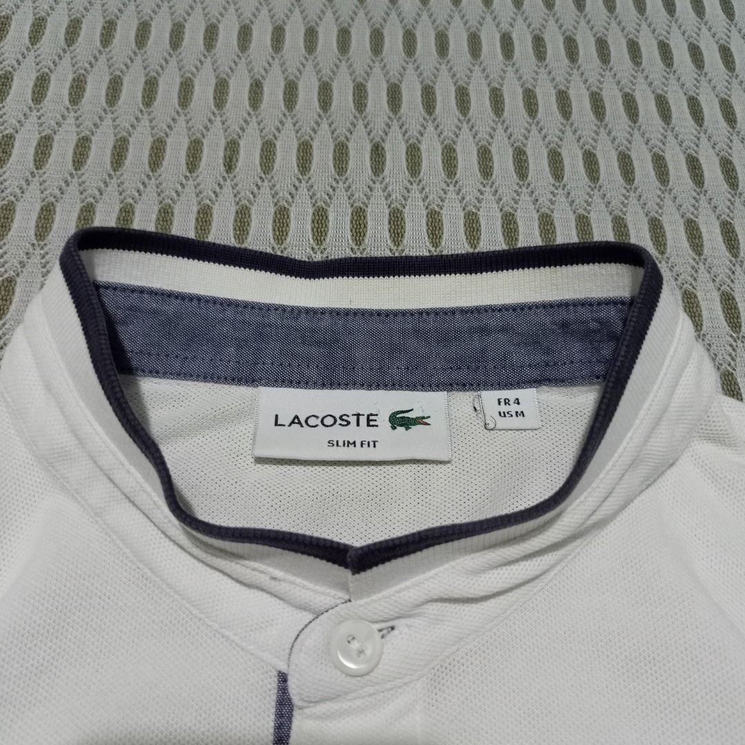 Lacoste Slim Fit White Mandarin Collar Size 4 (Category: Tshirts & Polo Shirts ) located in General Santos City (Dadiangas). Submitted by collection_9500 (Listing ID 1468499714, Image 3). Description: Lacoste Slim Fit White Mandarin Collar Size 4 20.5 x 26 Medium Excellent, washable stain Gensan loc Pm for inquiries All are thrifted items.