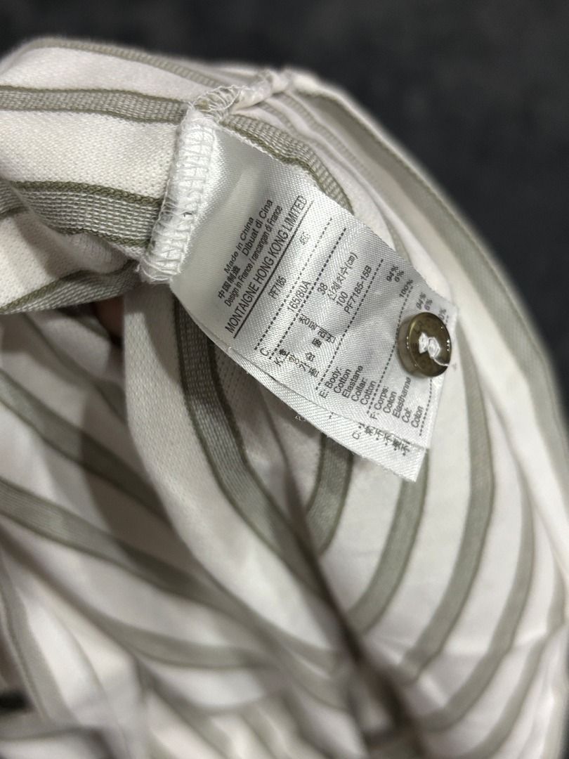 Lacoste Striped Polo Shirt Size 38 (Category: Tshirts & Polo Shirts ) located in Antipolo. Submitted by dddeclutter (Listing ID 1468357227, Image 3). Description: - Brand: Lacoste - Style: Striped short sleeve polo shirt - Color: White and olive green - Size: 38 (fits S to M).