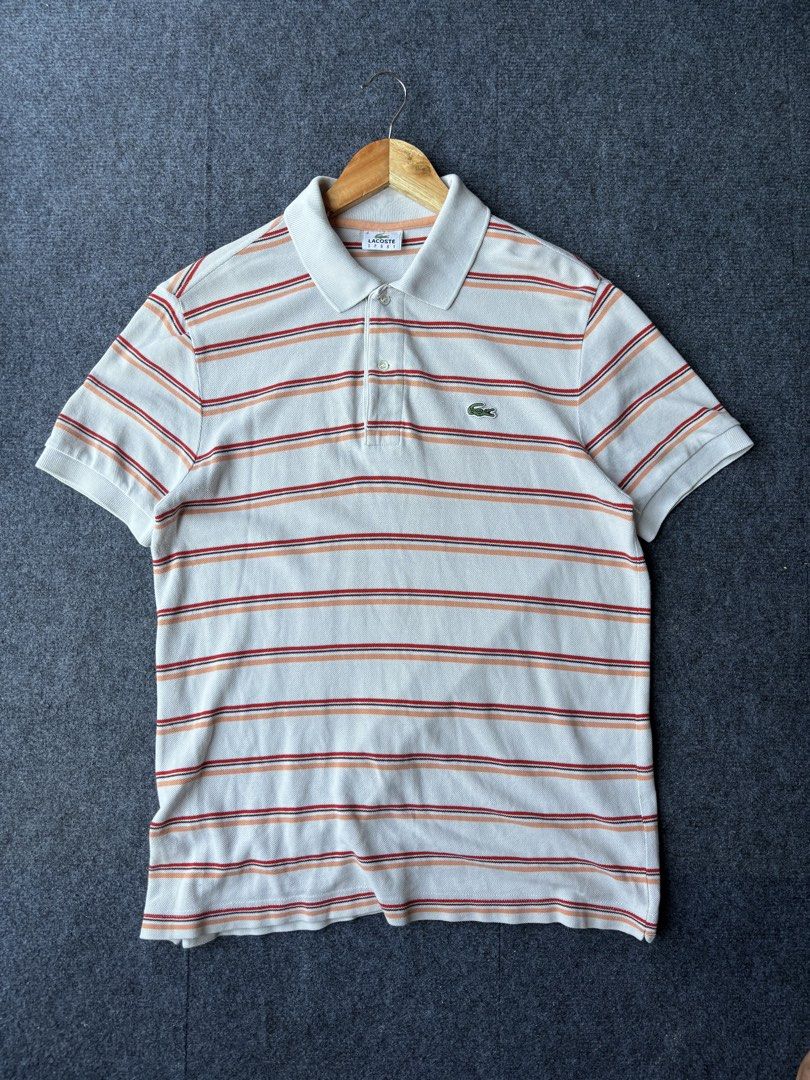 Lacoste Stripes Polo (Category: Tshirts & Polo Shirts ) located in Manila. Submitted by austinace04 (Listing ID 1468288167, Image 1). Description: Excellent Condition Size 4 On tag ( Medium ) 21.5 x 27 9.8/10 Color rate Issue none.