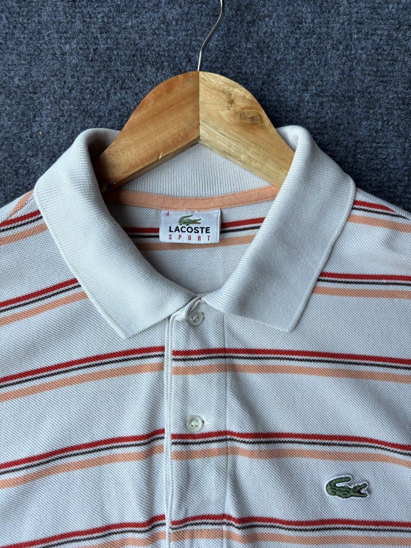 Lacoste Stripes Polo (Category: Tshirts & Polo Shirts ) located in Manila. Submitted by austinace04 (Listing ID 1468288167, Image 3). Description: Excellent Condition Size 4 On tag ( Medium ) 21.5 x 27 9.8/10 Color rate Issue none.