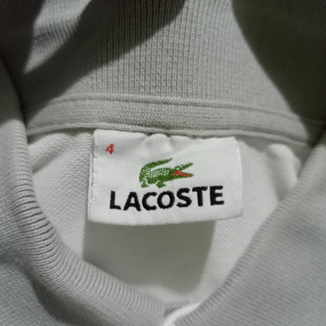 Lacoste White Grey Polo Shirt Size 4 (Category: Tshirts & Polo Shirts ) located in General Santos City (Dadiangas). Submitted by collection_9500 (Listing ID 1468477625, Image 3). Description: Lacoste White Grey Polo Shirt Size 4 19.5 x 24.5 Medium Excellent except washable stain Gensan loc Pm for inquiries All are thrifted items.