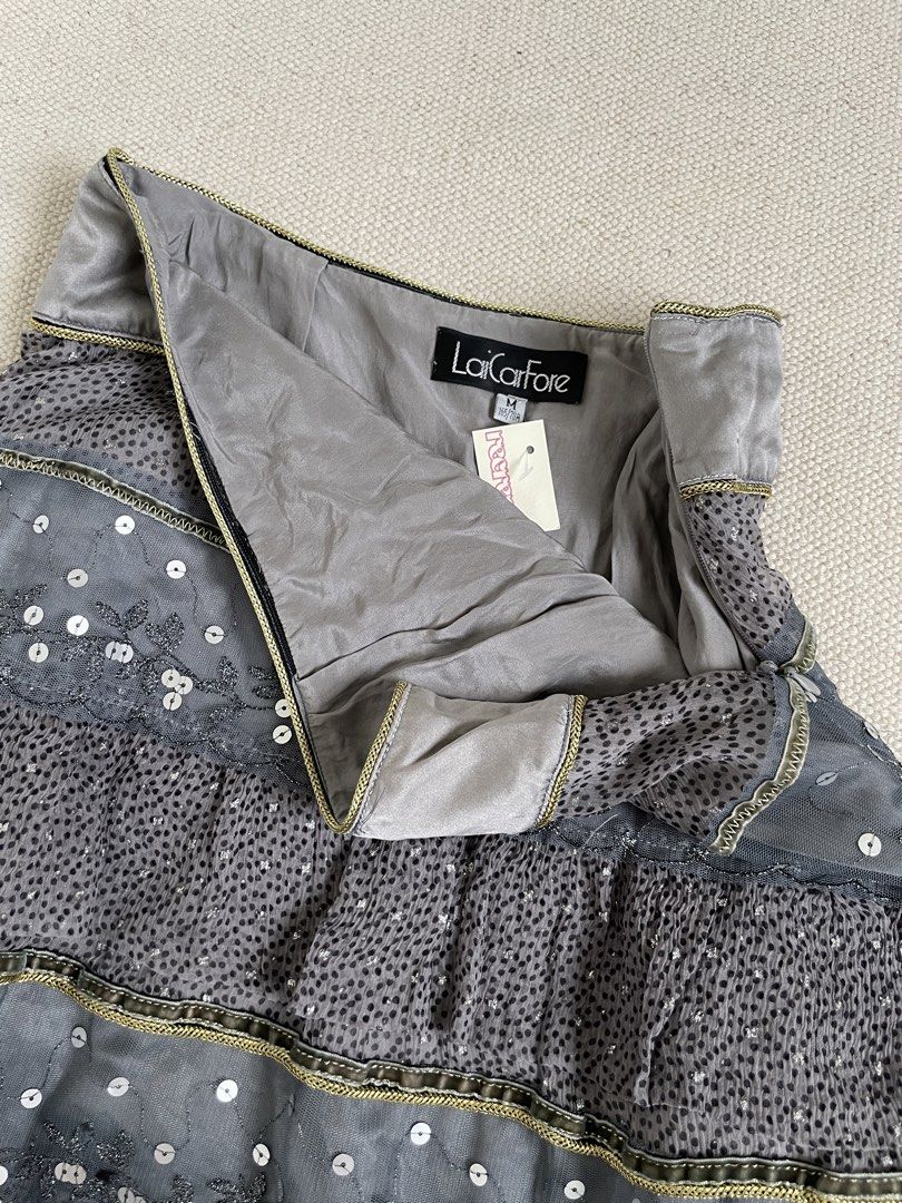 LaiCarFore Grey Sequin Tiered Skirt (Category: Skirts) located in Davao. Submitted by re.createph (Listing ID 1468446272, Image 2). Description: - Multiple ruffled tiers with subtle sequin details Waist: 26-27” Length: 24” .