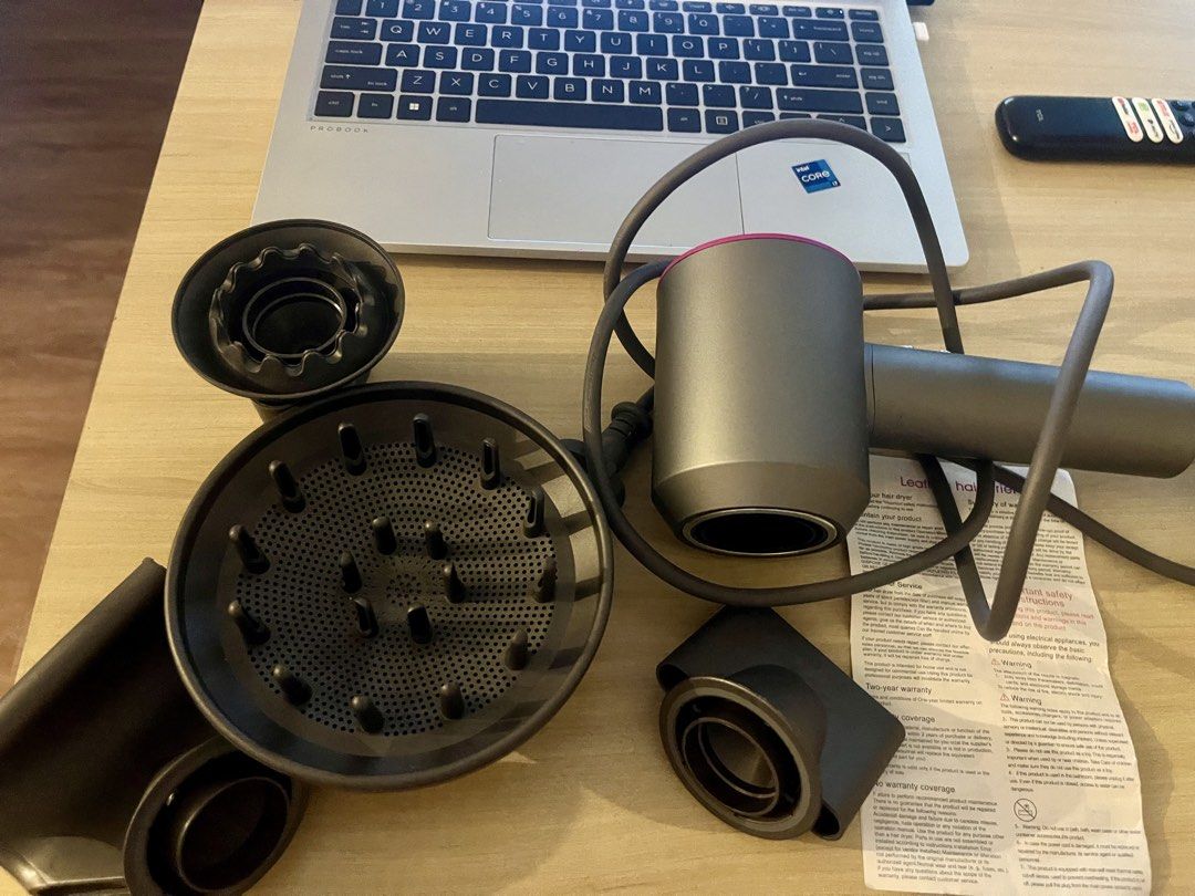 Leafless Hair Dryer with bag (Category: Hair) located in Pasig City. Submitted by sgangeles (Listing ID 1468367491, Image 3). Description: - Condition: Clean, well-maintained, and fully functional - Comes with original power cord and user manual/safety instructions.