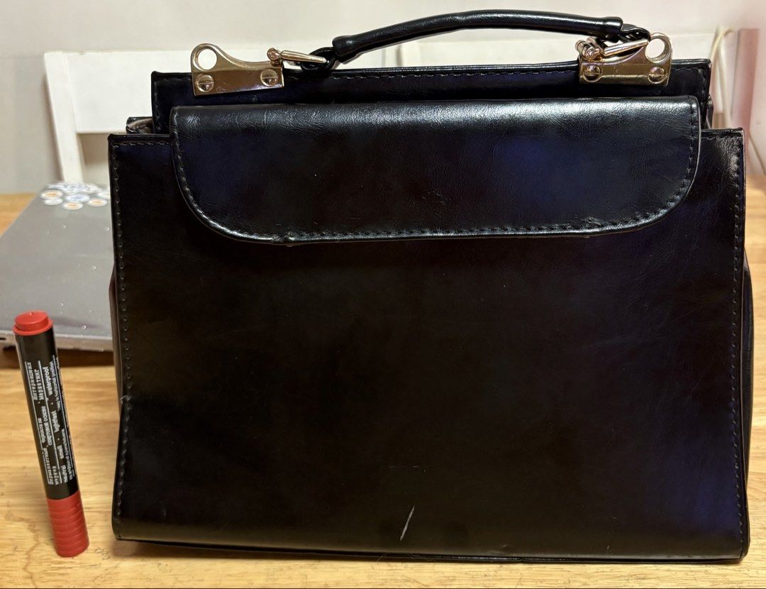 Leather Black Handbag (Category: Tote Bags) located in Marikina City. Submitted by thrifty_trinkets_by_anais (Listing ID 1468332026, Image 2). Description: 🌸 Selling own preloved/brand new items for less - EVERYTHING is negotiable as long as REASONABLE in price 🤗 🙏🏻 Please also check my account for more marked down items 🫶 📍Marikina near S&R/Uniqlo 💳 Maribank/Maya/Gcash 🏍️ Grab/Lalamove/J&T (by schedule) 🗓️ Offers/Reservations will be ho