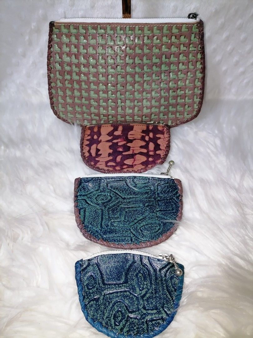 Leather Handtooled Purses (Category: Wallets & Card holders) located in Butuan. Submitted by az-branded.items (Listing ID 1468415439, Image 1). Description: Set of 4 Genuine leather Ykk zip lahat Authentic items From Japan.