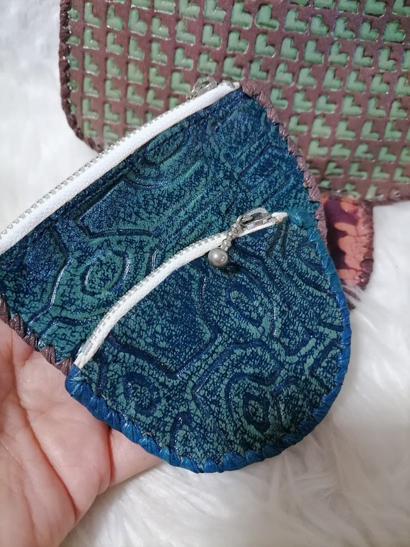 Leather Handtooled Purses (Category: Wallets & Card holders) located in Butuan. Submitted by az-branded.items (Listing ID 1468415439, Image 2). Description: Set of 4 Genuine leather Ykk zip lahat Authentic items From Japan.