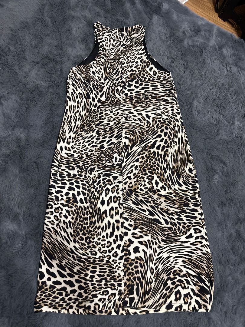 Leopard Print Sleeveless Midi Dress (Category: Dresses) located in Antipolo. Submitted by dddeclutter (Listing ID 1468359577, Image 2). Description: - Style: Sleeveless leopard print dress - Material: Lightweight and comfortable - Occasion: Versatile for casual outings or evening wear.