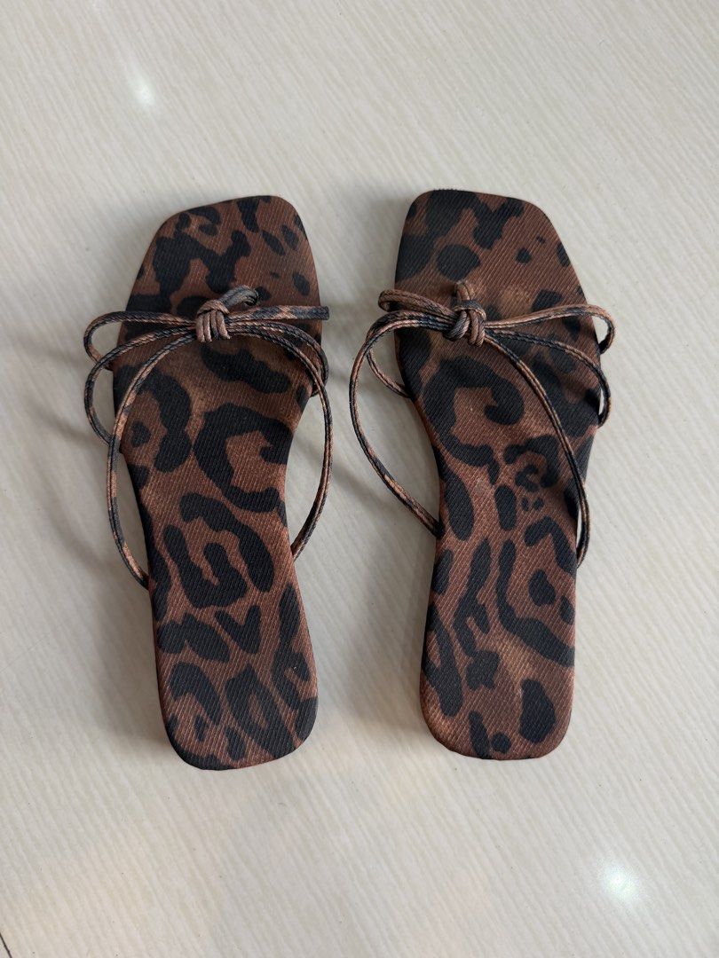 leopard print square toe twist-knot strap sandals (Category: Slippers and slides) located in Iloilo. Submitted by youngrabbit.b5670d (Listing ID 1468377856, Image 1). Description: Used once Still in pristine condition .