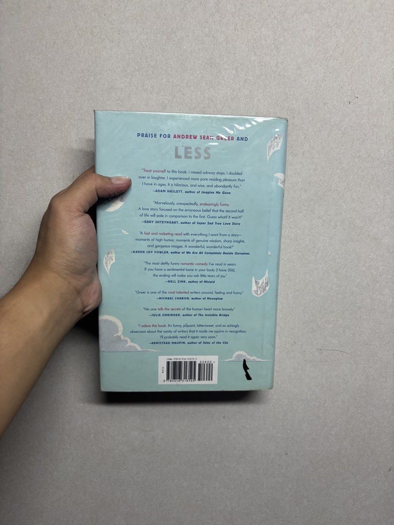 Less by Andrew Sean Greer (Category: Storybooks) located in Cabuyao City. Submitted by john.sellsthings (Listing ID 1468395668, Image 3). Description: Hardcover copy of Less by Andrew Sean Greer. Pulitzer Prize-winning novel published by Little, Brown and Company. Dust jacket included, covered in protective plastic wrapping. Pages show some yellowing and foxing spots along the edges. Stamp from previous owner on the title page. MOP: Gcash MOD: J&
