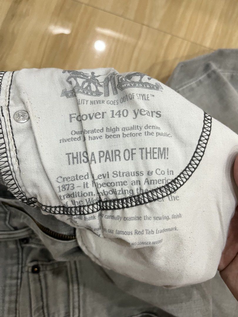 Levi's 514 Grey Distressed Jeans W32 L32 (Category: Jeans) located in Angeles City. Submitted by thriftsij (Listing ID 1468446983, Image 2). Description: - Brand: Levi's 514 - Size: W32 L32 W32 L41 LO7.5 - Color: Classic washed grey - Details: Factory distressed with ripped spots on the front legs and pocket area - Closure: Button fly with stamped button number 4986 - Features: Inside care tags and Levi's printed pocket lining attached - Fit: Com