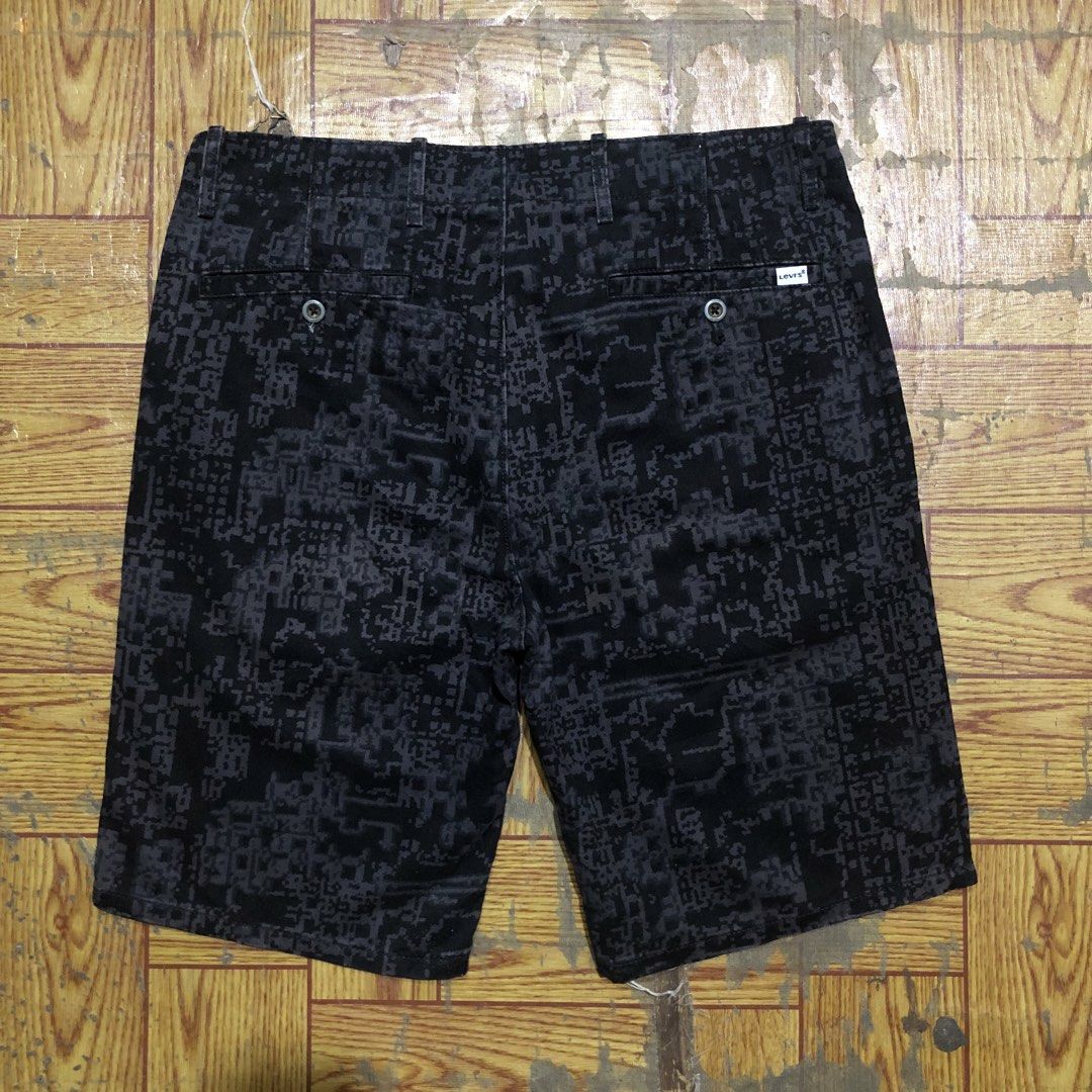 Levi’s pixelated camou print jorts (Category: Shorts) located in Dasmarinas. Submitted by corenyxmessy_3rd_account (Listing ID 1468462459, Image 1). Description: waist - 34 to 35 length - 20.5.