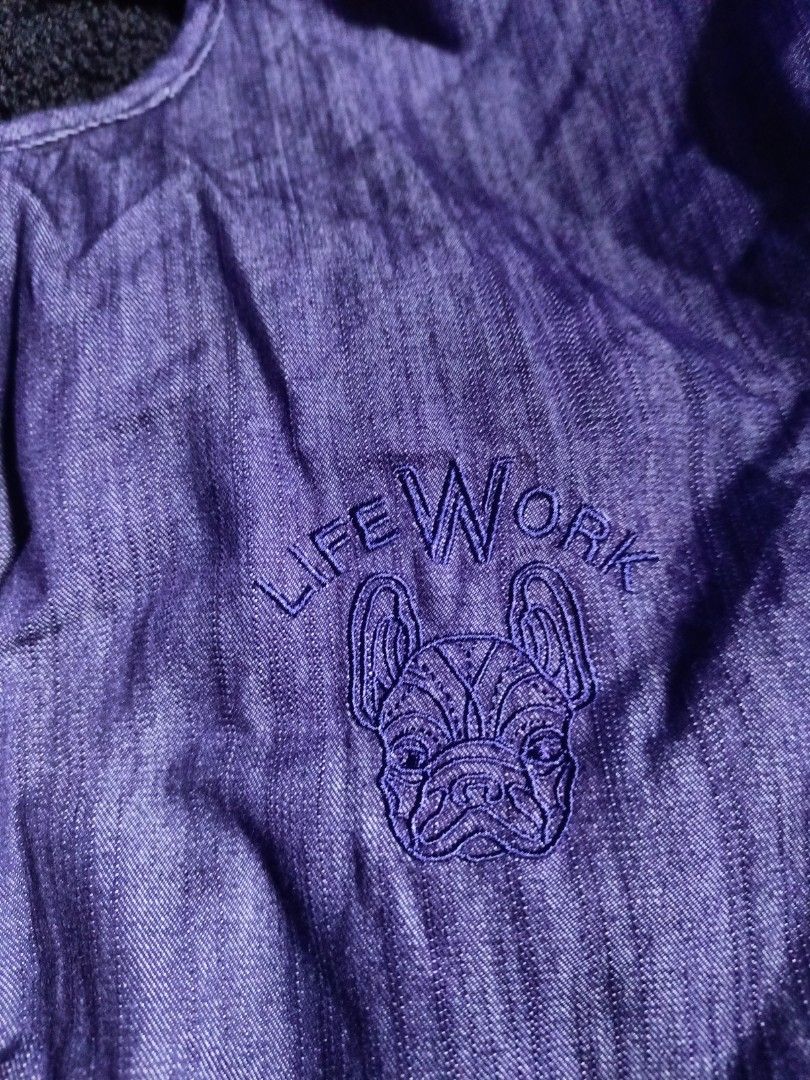 Lifework reversible fleece jacket (Category: Coats, Jackets and Outerwear) located in Mandaluyong City. Submitted by heatgear (Listing ID 1468418442, Image 3). Description: reversible fleece jacket - Style: Blue denim outer shell with cozy black fleece lining - Closure: Snap button front - Pockets: Two vertical side pockets - Details: V-neck collar, long sleeves, and small embroidered chest graphic - Condition/Fit: Comfortable and warm, ideal for
