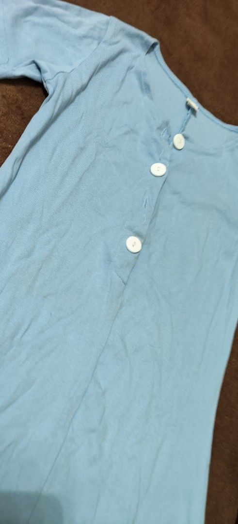 Light blue button-front short sleeve mini dress YyRuji (Category: Dresses) located in Manila. Submitted by snz_shop (Listing ID 1468446759, Image 1). Description: - Brand: YyRuji - Color: Light blue - Material: Soft and stretchy ribbed knit fabric - Design: Scoop neckline with decorative white front buttons - Length: Short sleeves, hits above the knee - Style: Casual everyday wear.