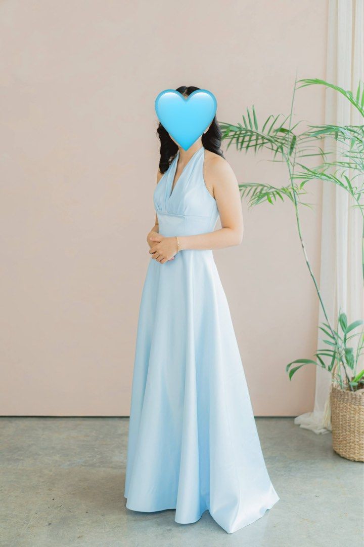 Light blue halter neck long maxi evening dress (Category: Evening dresses & gowns) located in Davao. Submitted by purge_my_closet (Listing ID 1468331283, Image 1). Description: - Color: Light blue - Material: Smooth satin with a subtle shine - Design: Halter neckline with a deep V-cut bodice and fitted waist - Cut: Flared A-line long skirt - Condition: Worn once for a wedding, clean, and in great shape - Custom Made.