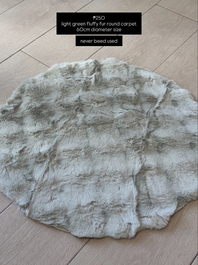 Light green fluffy fur round carpet 60cm diameter size (Category: Carpets, Mats & Flooring) located in Mandaluyong City. Submitted by ireneangelinee (Listing ID 1468378958, Image 1). Description: - Color: Light green - Shape: Round - Size: 60cm diameter - Material: Super soft fluffy fur - Condition: Brand new, never used, properly stored - Perfect for: Bedroom or living space decor Rfs: i bought the wrong color.