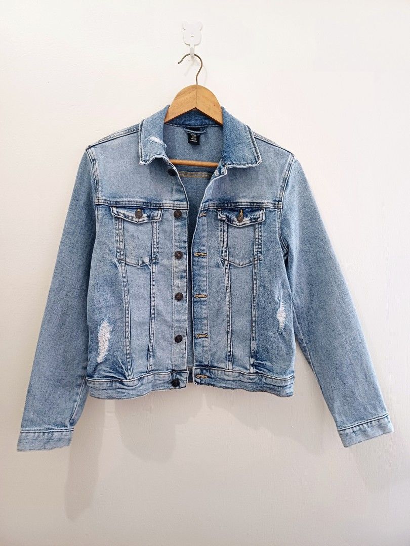 Light wash distressed denim jacket (Category: Coats, Jackets and Outerwear) located in Pasig City. Submitted by eden_online_shop (Listing ID 1468341664, Image 1). Description: - Shoulder: 41cm - Length: 50cm - Width: 40cm - Bust: 36cm - Fits S - Color/Wash: Light wash denim - Design: Stylish distressing details on the front - Closure: Button-up front and fitted button cuffs - Pockets: Two functional chest pockets - Neckline: Classic collar - Fit/