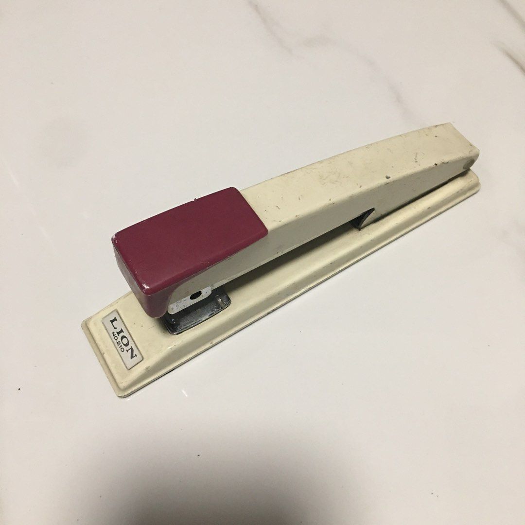 Lion No. 210 Heavy Duty Stapler (Category: Stationery & School Supplies) located in Pasay City. Submitted by gilbertso62551 (Listing ID 1468387416, Image 1). Description: - Brand/Model: Lion No. 210 Heavy-Duty Desktop Stapler - Colorway: Retro cream and maroon - Build: Sturdy metal construction with non-slip rubber grip pads underneath - Features: Long-reach mechanism, perfect for binding thick stacks of paper - Staple Type: Uses No. 210 staples 