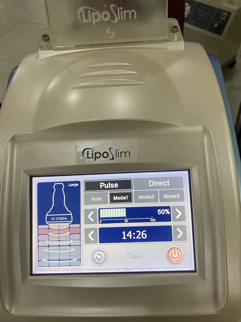Lipo Slim Body Contouring Machine with Touchscreen (Category: Body Care) located in Marikina City. Submitted by jtv17 (Listing ID 1468309866, Image 3). Description: - Professional Lipo Slim body contouring and fat reduction machine - Touchscreen control panel featuring Pulse and Direct settings with multiple modes - Includes two applicator heads and a convenient rolling stand with storage shelf - Fully functional and power-up tested - Perfect for
