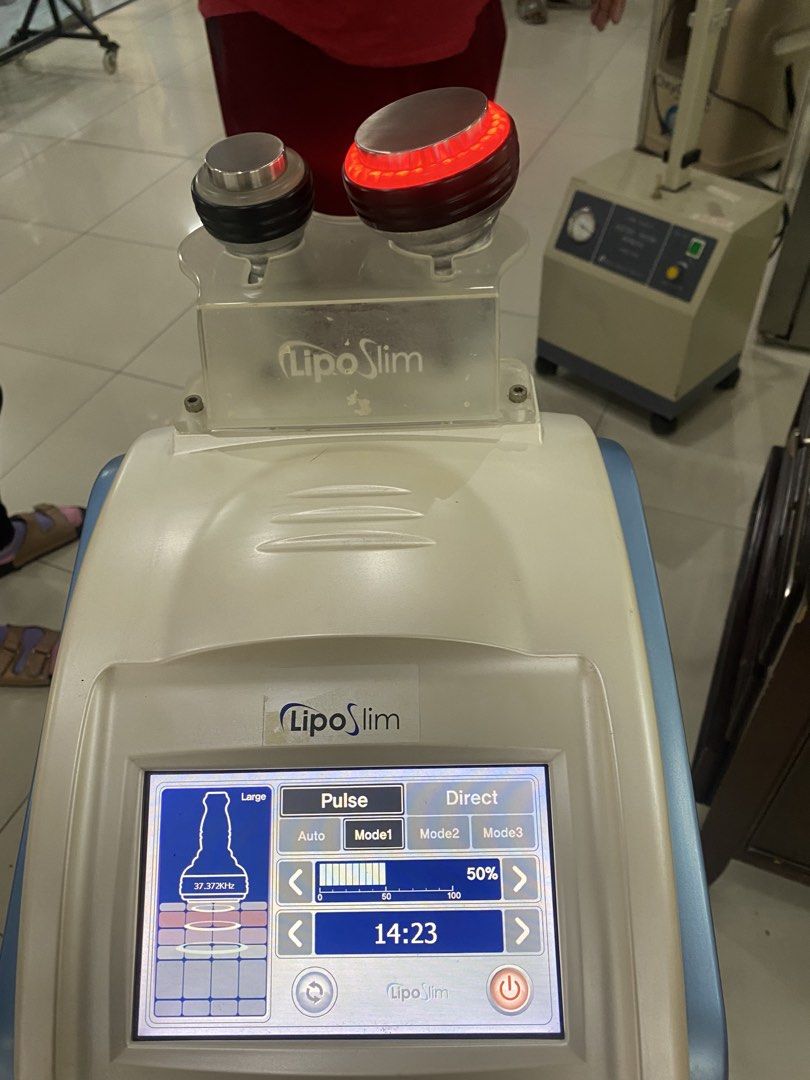 Lipo Slim Body Contouring Machine with Touchscreen (Category: Body Care) located in Marikina City. Submitted by jtv17 (Listing ID 1468309866, Image 2). Description: - Professional Lipo Slim body contouring and fat reduction machine - Touchscreen control panel featuring Pulse and Direct settings with multiple modes - Includes two applicator heads and a convenient rolling stand with storage shelf - Fully functional and power-up tested - Perfect for