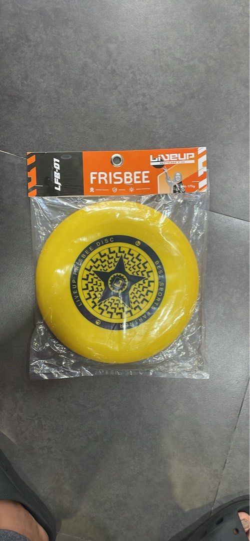 Liveup Sports Frisbee 175g Disc (Category: Racket and Ball Sports) located in Manila. Submitted by cairosebastian (Listing ID 1468303073, Image 2). Description: - Brand: Liveup Sports - Weight: 175g (Standard tournament weight) - Condition: Brand new, still sealed in original plastic packaging - Design: Eye-catching star graphic in the center - Colors Available: Bright yellow and vibrant orange - Perfect for: Outdoor games, park hangouts, and bea