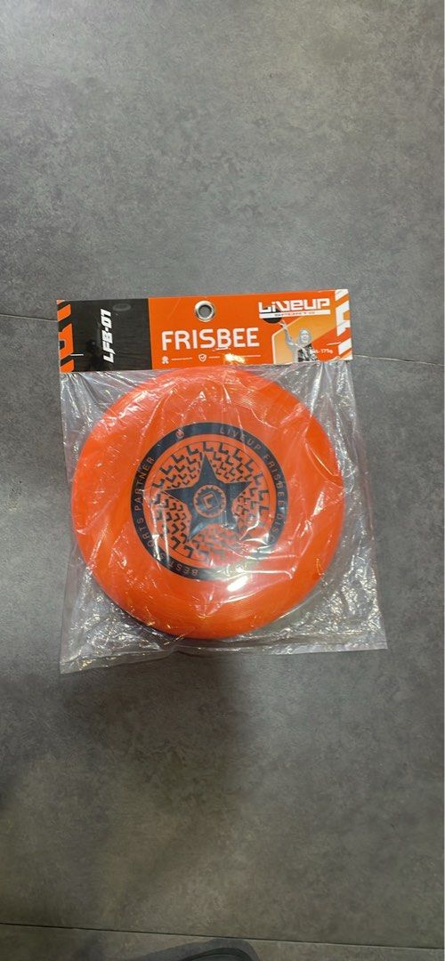 Liveup Sports Frisbee 175g Disc (Category: Racket and Ball Sports) located in Manila. Submitted by cairosebastian (Listing ID 1468303073, Image 3). Description: - Brand: Liveup Sports - Weight: 175g (Standard tournament weight) - Condition: Brand new, still sealed in original plastic packaging - Design: Eye-catching star graphic in the center - Colors Available: Bright yellow and vibrant orange - Perfect for: Outdoor games, park hangouts, and bea