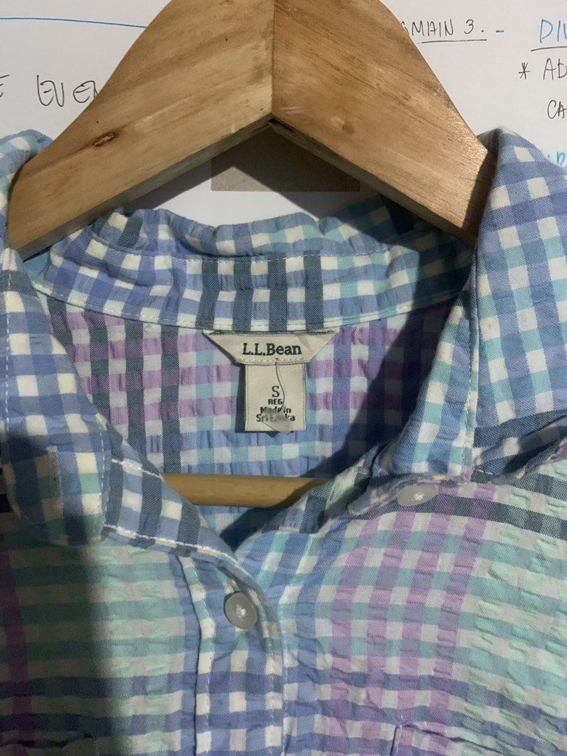 LL Bean Plaid Button Up Shirt Size S Regular (Category: Shirts) located in Naga. Submitted by than09070539101 (Listing ID 1468384552, Image 2). Description: - Brand: L.L. Bean - Size: S Regular - Color/Pattern: Blue, purple, and green plaid - Material: 100% lightweight cotton seersucker - Features: Collared neck, front button closure, long sleeves with button cuffs - Condition: Excellent pre-loved condition.