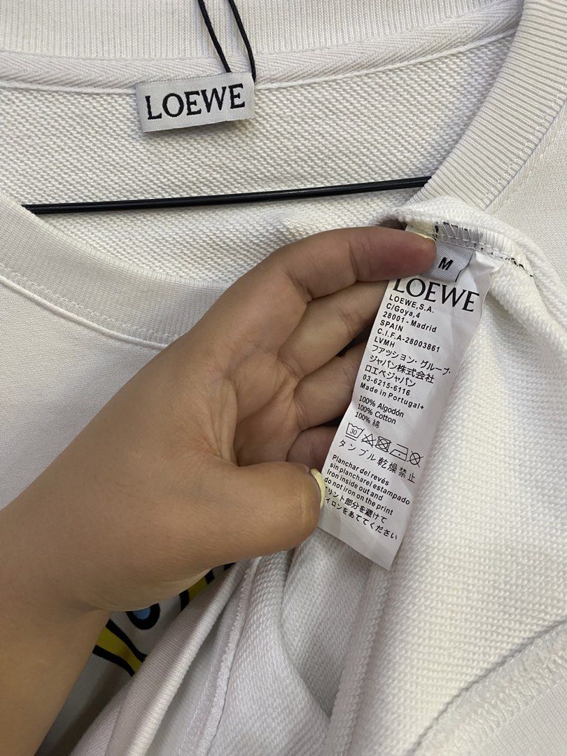LOEWE SWEATER (Category: Luxury Apparel) located in Baguio. Submitted by lairdegawd_06 (Listing ID 1468461912, Image 3). Description: Dimes-23.5x31 M-L Excellent condition 10/10 color rate No flaw Complete tags Check photos for more details.