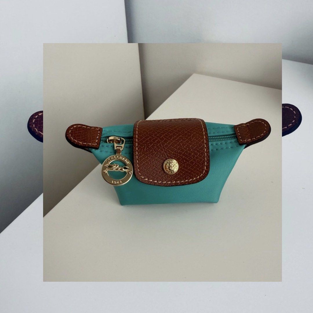 Longchamp Coin Purse (Turquoise) (Category: Luxury Bags & Wallets) located in Caloocan City. Submitted by anne0532 (Listing ID 1468338097, Image 1). Description: freebie: bag organizer.