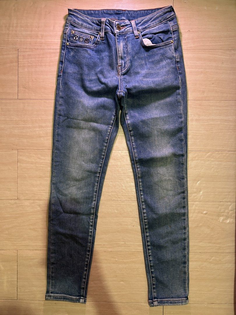 Louis Vuitton Blue Denim Jeans Size 26 (Category: Luxury Apparel) located in Dipolog. Submitted by adrian281994 (Listing ID 1468431654, Image 1). Description: - Brand: Louis Vuitton - Size: 26 (Slim fit, straight legs) - Wash: Classic blue denim - Details: Embroidered LV logo on back pocket, branded leather waistband patch, and printed monogram pocket lining - Hardware: Metal details on coin pocket - Condition: Excellent / High quality.