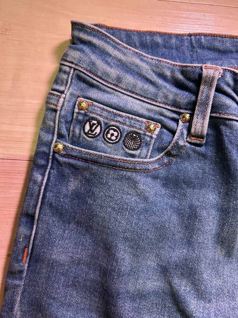 Louis Vuitton Blue Denim Jeans Size 26 (Category: Luxury Apparel) located in Dipolog. Submitted by adrian281994 (Listing ID 1468431654, Image 3). Description: - Brand: Louis Vuitton - Size: 26 (Slim fit, straight legs) - Wash: Classic blue denim - Details: Embroidered LV logo on back pocket, branded leather waistband patch, and printed monogram pocket lining - Hardware: Metal details on coin pocket - Condition: Excellent / High quality.