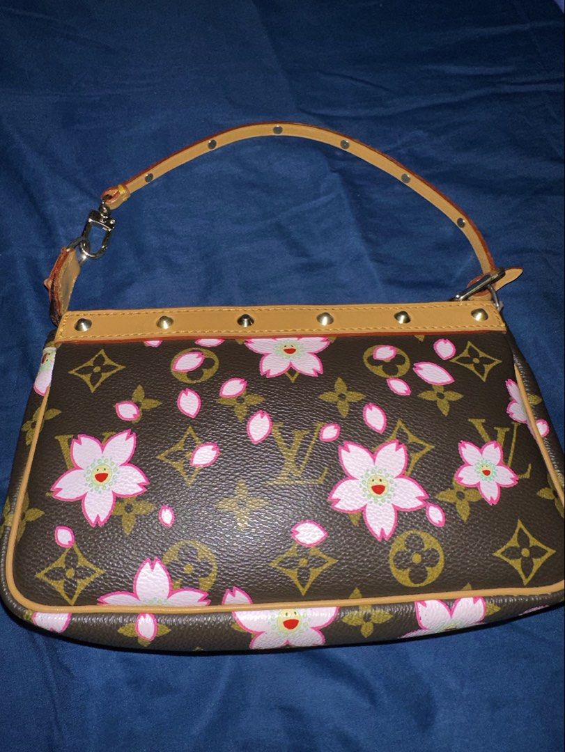 Louis Vuitton Cherry Blossom Pochette (Category: Luxury Bags & Wallets) located in Pasig City. Submitted by decluttering_slay (Listing ID 1468471496, Image 2). Description: •seller’s fave •very good condition •barely used •very rare limited edition .