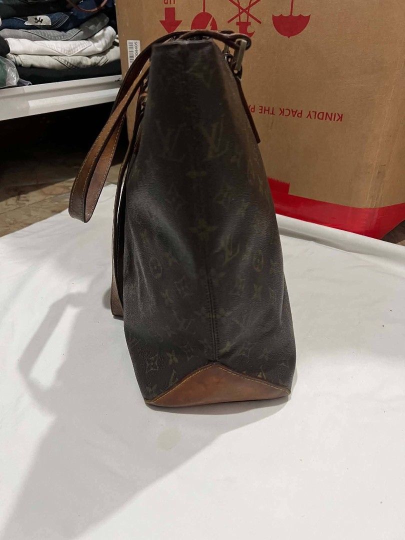 Louis Vuitton Monogram Cabas Piano Tote Bag (Category: Luxury Bags & Wallets) located in Manila. Submitted by zenbear_6b2d8a (Listing ID 1468322914, Image 2). Description: - Classic Louis Vuitton monogram canvas tote bag with premium leather straps and trim - Elegant gold-tone hardware and secure top zip closure - Spacious interior with fabric lining, zippered pocket, and phone pocket - Features 'Louis Vuitton Paris Made in France' stamp on the l