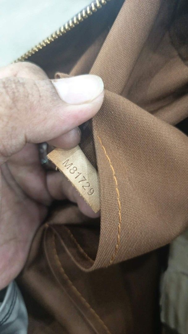Louis Vuitton Monogram Canvas Tote Bag (Category: Luxury Bags & Wallets) located in Manila. Submitted by youngbear.185ac4 (Listing ID 1468304226, Image 2). Description: - Classic Monogram canvas with brown leather trim - Secure zippered top closure and convenient front slip pockets - Dual top handles and brown fabric interior lining - Made in France - Condition: Shows normal wear on corners and leather straps.